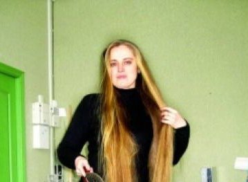 В Черкасах живе дівчина з рекордною довжиною волосся у країні